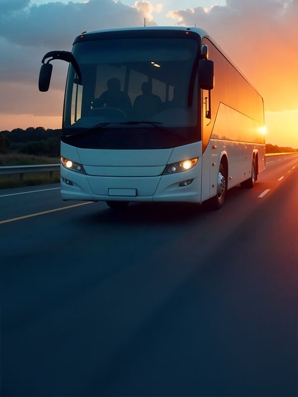 Charter bus parked outside a stadium ready for team pickup